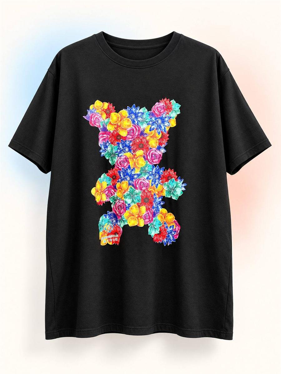 Full view of a black T-shirt with a colorful floral print